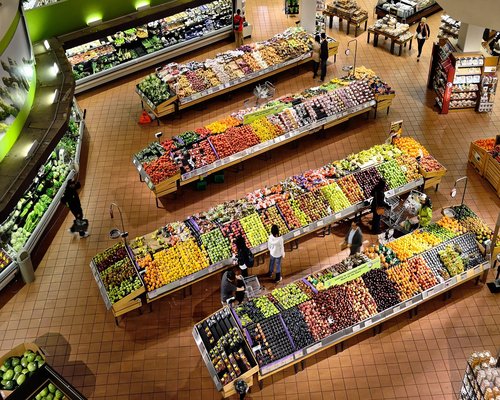Fresh fruits and colorful vegetables in a market basket